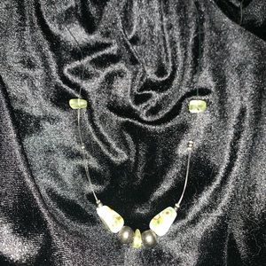 Asía motif necklace. Sold separately or as set.